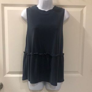 Sleeveless blue shirt